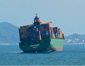 A container ship rolls in the swell in Manzanillo Mexico